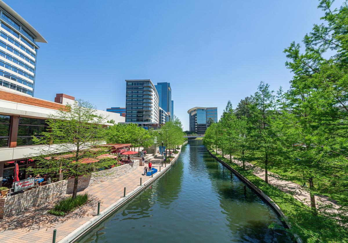 The Woodlands Waterway surrounded by trees